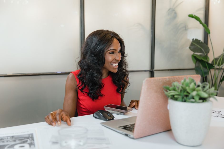 professional business owner smiling in a bright office